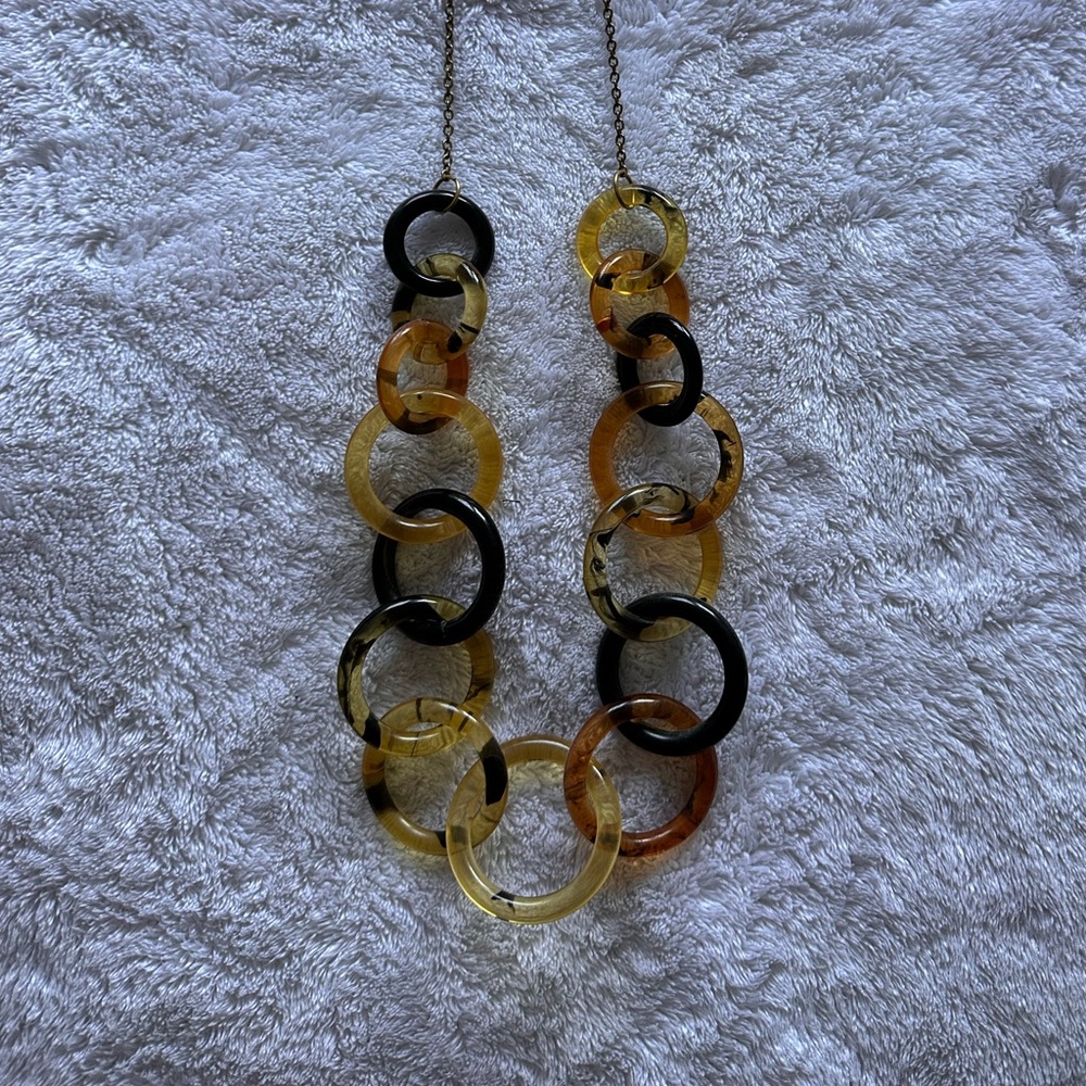 Long tortoise colored necklace
